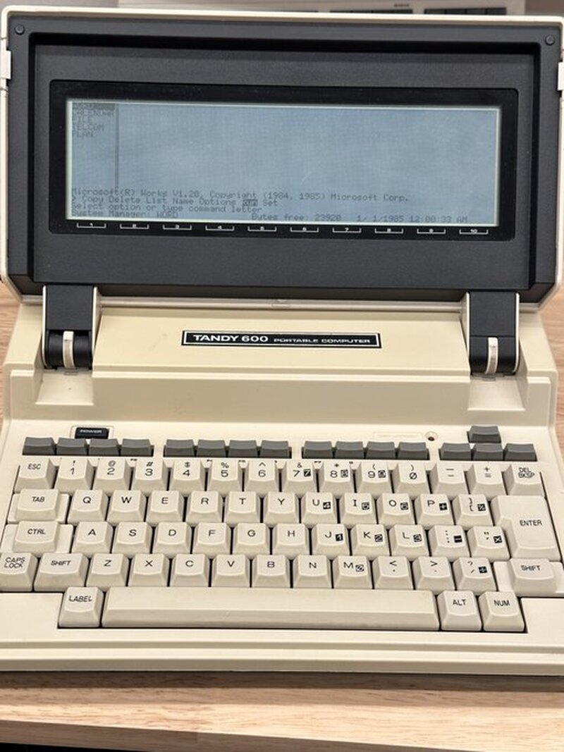 Tandy 600 Update: IT WORKS! After removing the system battery pack and the backup battery, plugging in a tested supply, and performing a 