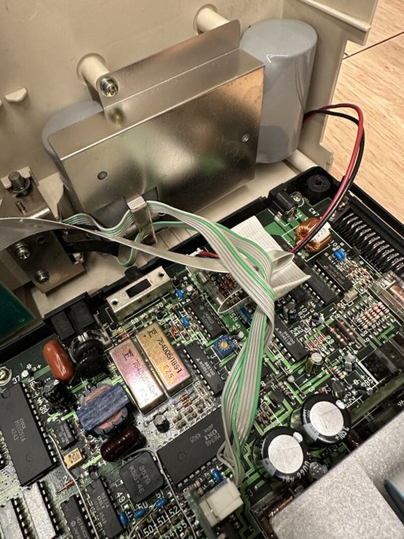 Tandy 600 Update: IT WORKS! After removing the system battery pack and the backup battery, plugging in a tested supply, and performing a 